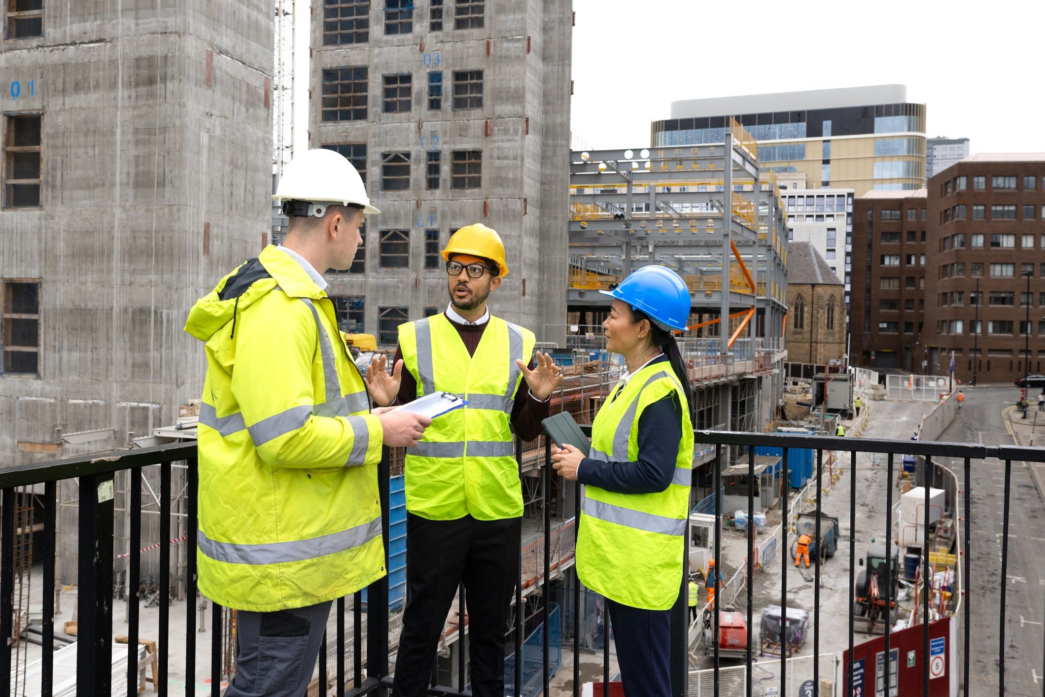 Construction team reviewing plans together